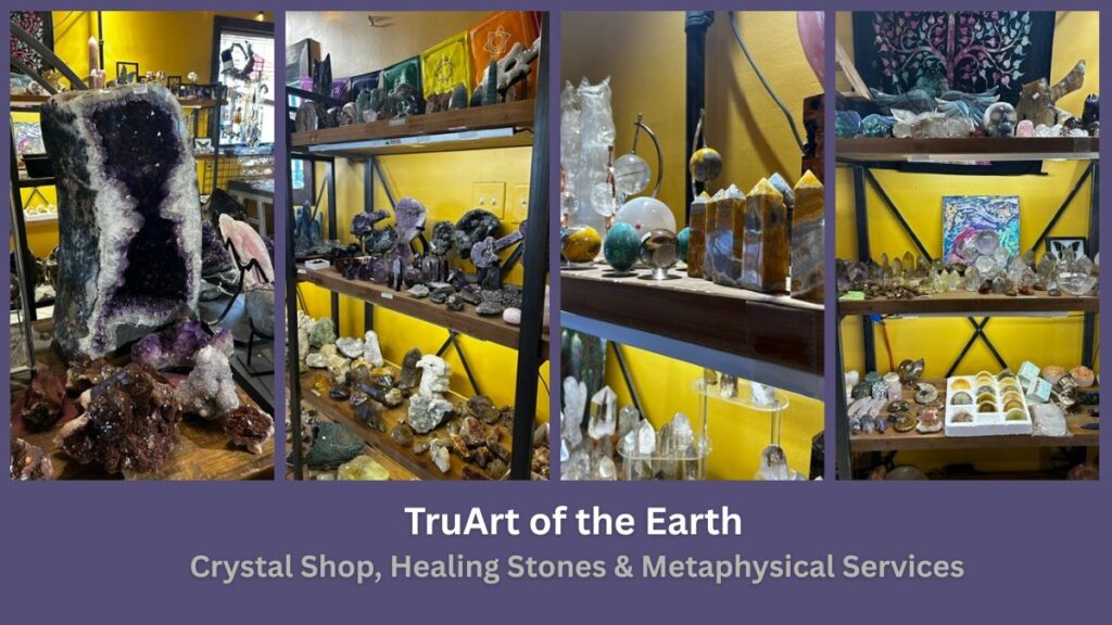 Shelves display a variety of crystals, minerals, and healing stones in a shop with yellow walls and decorative art in Mesilla. Text below reads: TruArt of the Earth—Crystal Shop, Healing Stones & Metaphysical Services. A premier crystal shop Mesilla NM
